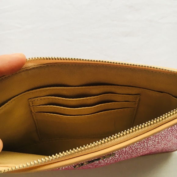 NWT Coach pink shimmer wristlet. Never worn. - Picture 2 of 5